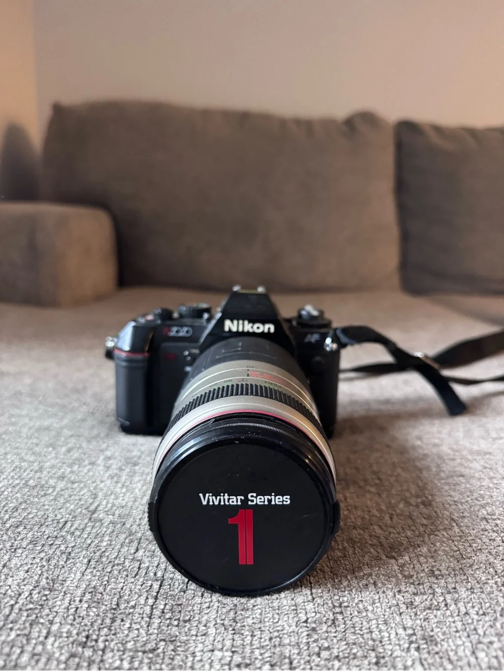 Nikon SLR Camera with Vivitar Series Lens - Black and Red Accents